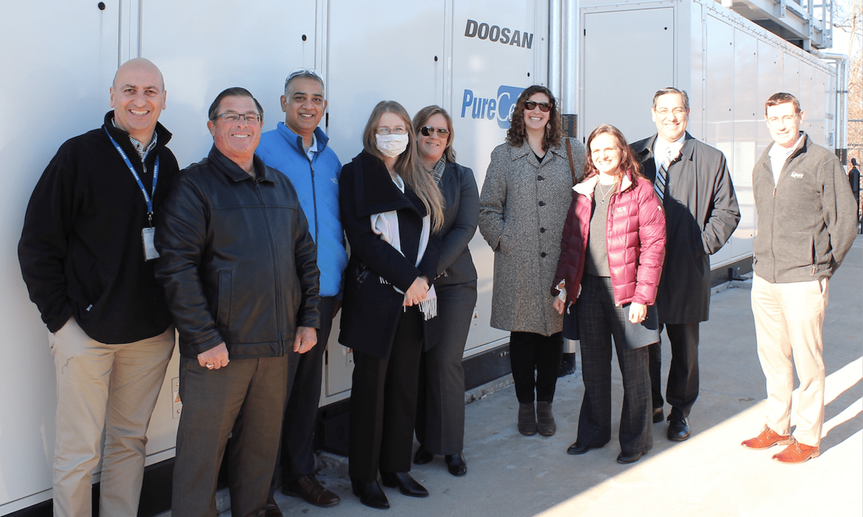 CT Hydrogen Task Force Members in front of HyAxiom's 5 MW fuel cell installation in South Windsor, CT